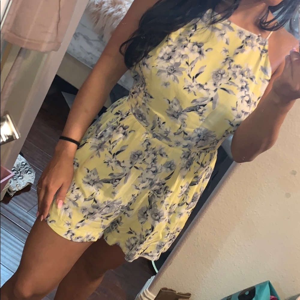 Yellow floral print romper!